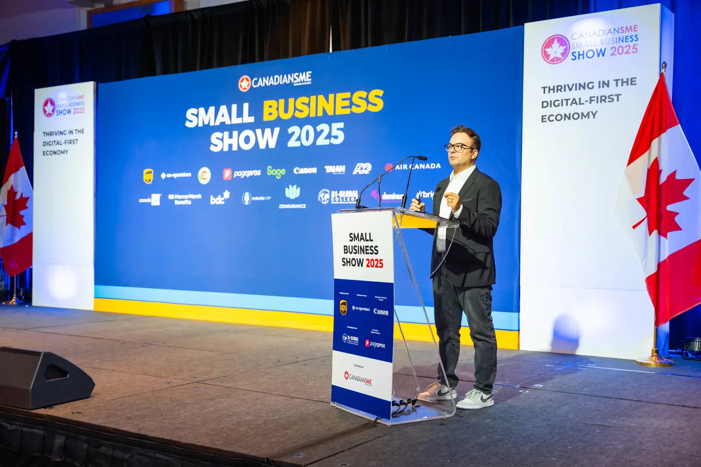 Keynote speaker at a branded podium